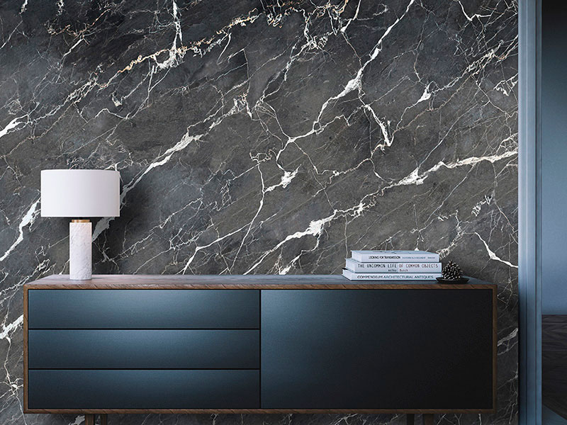 Wallpaper with realistic black marble with white and gold veins covering a sophisticated home