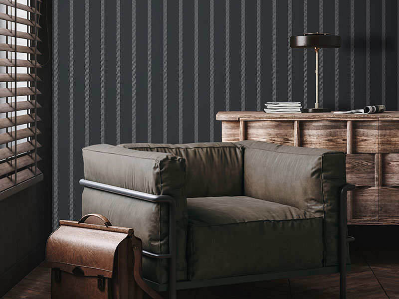 Striped wallpaper, with vertical stripes on a grey background, that furnishes a male home