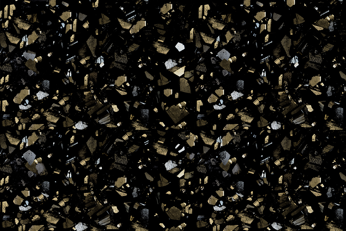 Decorative textured wallpaper with gold and silver crystals on a black background