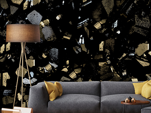Decorative textured wallpaper with large gold and silver crystals on a black background