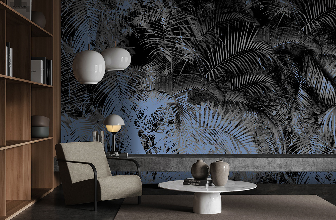 Tropical wallpaper with palm leaves in blue and gray which adorns a living room