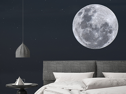 Wallpaper with full moon on blue starry sky background in a bedroom