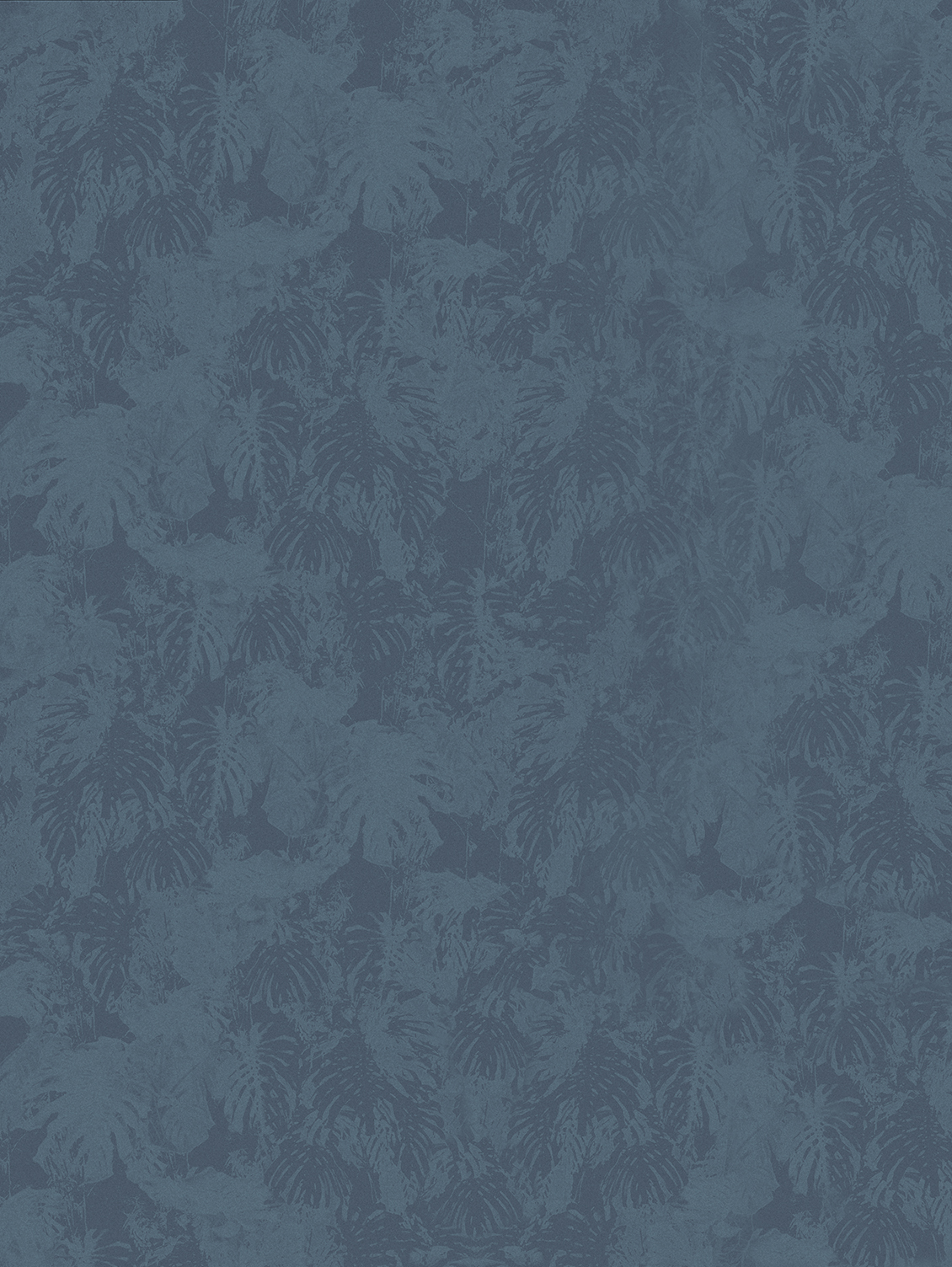 Wall covering in shades of blue with texture of tropical leaves, fabric effect, in a living room