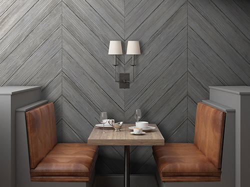 Industrial style concrete effect wallpaper with fishbone geometry in a modern room