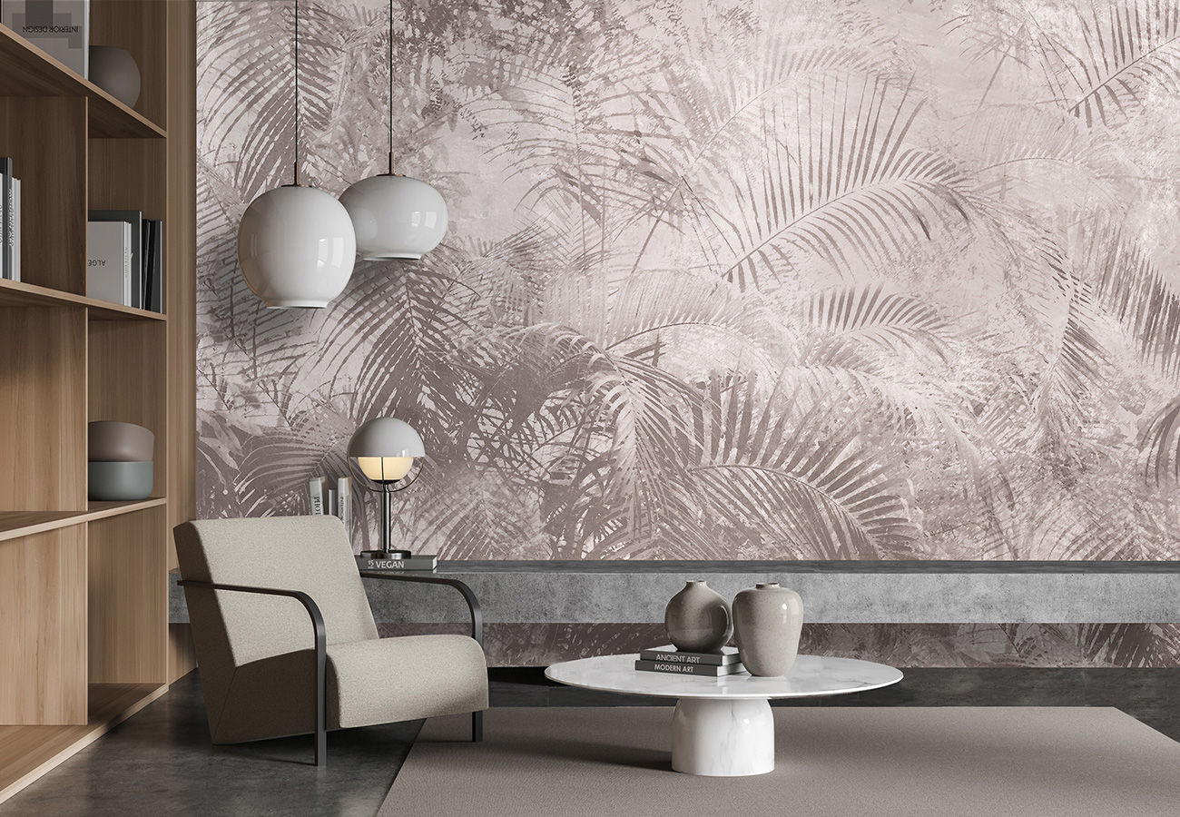 Tropical wallpaper with palm leaves in blue and gray which adorns a living room