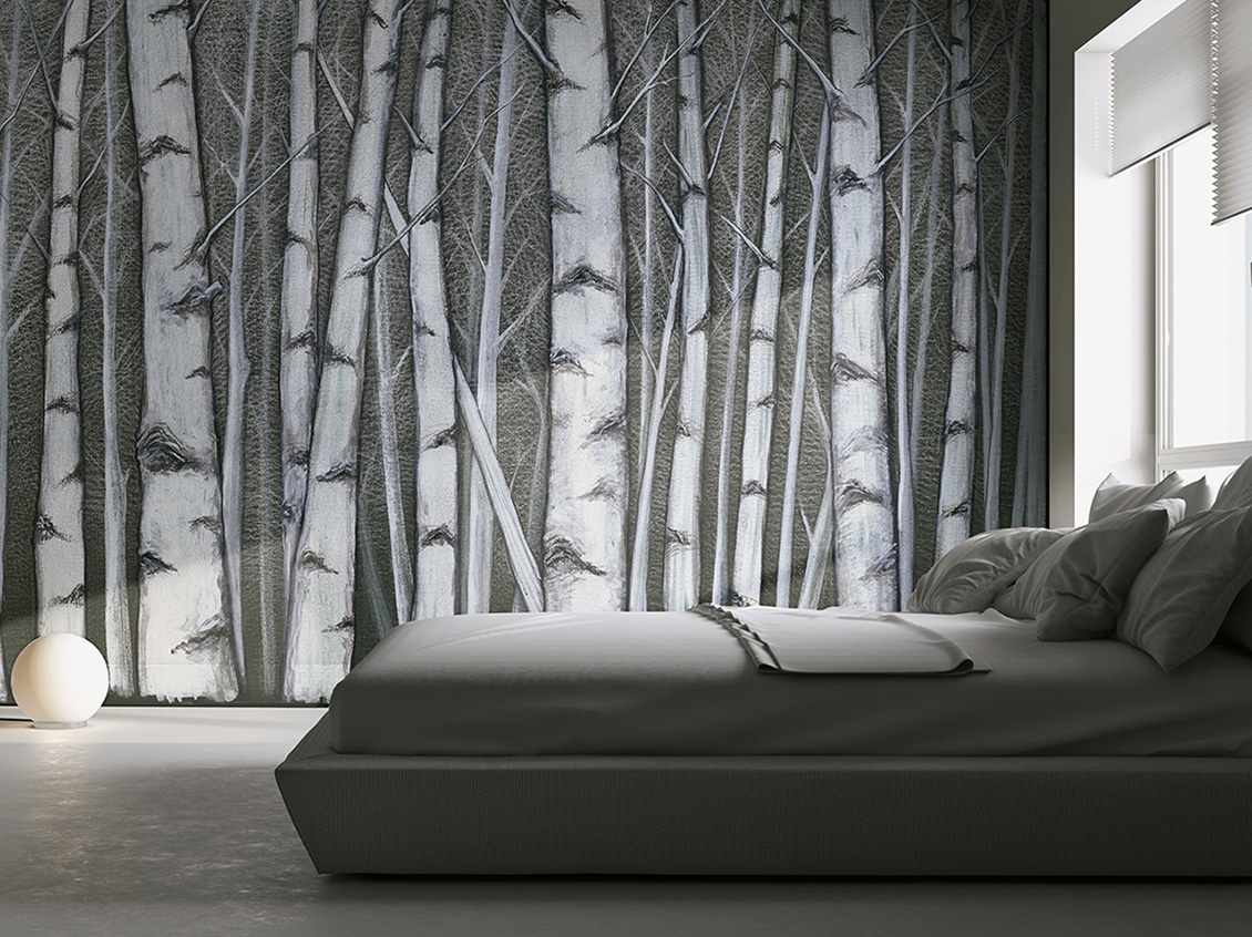 Hand-painted wallpaper with birch trees on a green background, in a bedroom